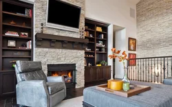 Photo of a loft-style living room with a fireplace