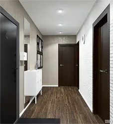 Apartment design dark floor and doors