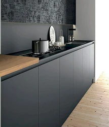 Black And White Kitchen With Wooden Countertop Photo