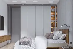 Built-in wardrobes in the bedroom up to the ceiling design