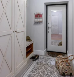 Hallway design with mirror on the front door