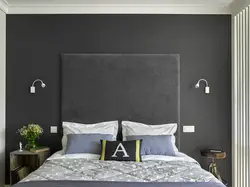 Bedroom interior with dark wall near the bed