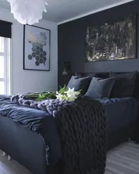 Bedroom Interior With Dark Wall Near The Bed