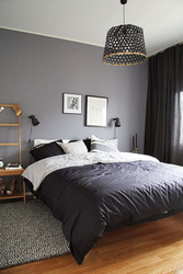 Bedroom interior with dark wall near the bed