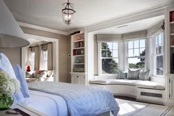 Photo of a bedroom in a house with one window in a modern style