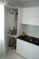 How to close the pipes in the kitchen in the corner photo