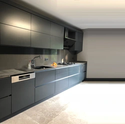 Gray white kitchen with black countertop photo