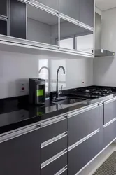 Gray White Kitchen With Black Countertop Photo