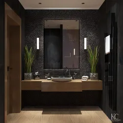 Bathroom design with dark tiles and wood