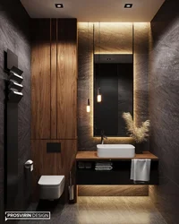 Bathroom design with dark tiles and wood