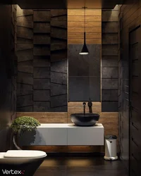 Bathroom design with dark tiles and wood