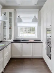 U-Shaped Kitchen With Sink By The Window Photo