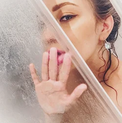 Beautiful photos in the shower in the bathroom