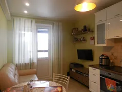 Kitchen 12 square meters with sofa and TV photo