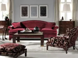 Living room interior with burgundy furniture