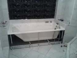 How to install a plastic bathtub photo