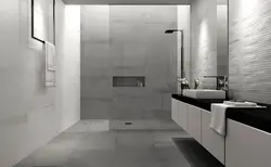 Light porcelain tiles in the bathroom interior photo