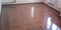 Laying tiles in an apartment photo