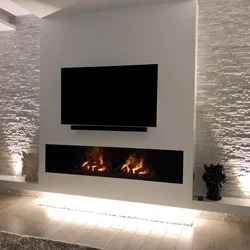 Bio fireplace in the living room with TV photo