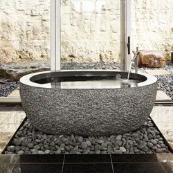 Bathtubs made of artificial stone in the interior photo