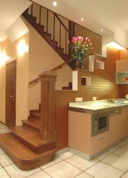 Kitchen Design In Your House With Stairs To The Second Floor