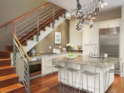 Kitchen design in your house with stairs to the second floor