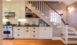 Kitchen design in your house with stairs to the second floor