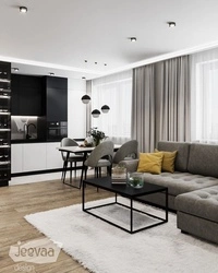 Living room design with black kitchen