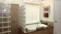 Bathtub With Glass Block Partition Photo
