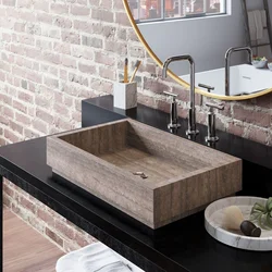 Stone sink in the bathroom interior