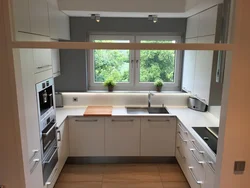 Kitchen layout with one window photo