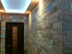 Plaster with stone in the hallway photo