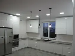 Glossy corner kitchen in the interior