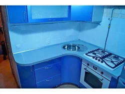 Small corner kitchen design with sink in the corner