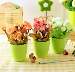 Artificial Flowers In Pots In The Kitchen Interior