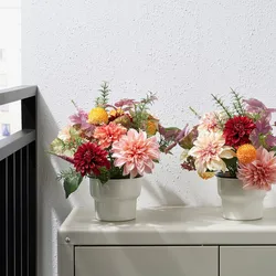 Artificial flowers in pots in the kitchen interior