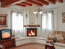 Design Of A Living Room In A House With A Stove And Fireplace