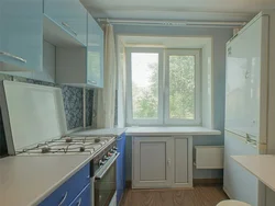 Khrushchev kitchen design with a niche under the window