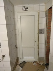 PVC Door To The Bathroom Photo