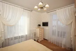Interior of curtains in a bedroom with one window