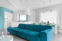 Living room kitchen design in turquoise tones