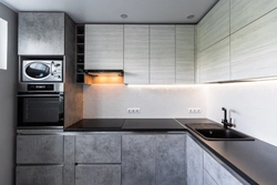 Gray concrete color in the kitchen interior