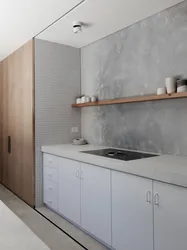 Gray concrete color in the kitchen interior