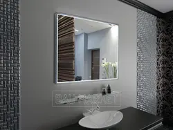 Bathtub with illuminated mirror photo