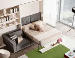 Sofa in the bedroom with bed interior photo