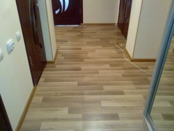 Laminate flooring in the apartment corridor photo