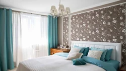 Curtains in the bedroom interior with blue wallpaper