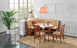 Фото кухни с диваном и столом стульями