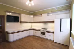 Photo Of Corner Kitchen With TV