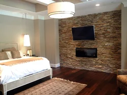 Photo bedroom design with decorative stone